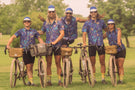 charcoal_grey Group of five bike riders in the same clothes wearing Ombraz armless strap sunglasses
