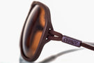 MATTEBROWN_BROWN Side shot of Ombraz unisex brown brown classic armless sunglasses with cord