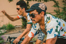 dolomite_charcoal_grey Two guys biking wearing Ombraz dolomite armless strap sunglasses